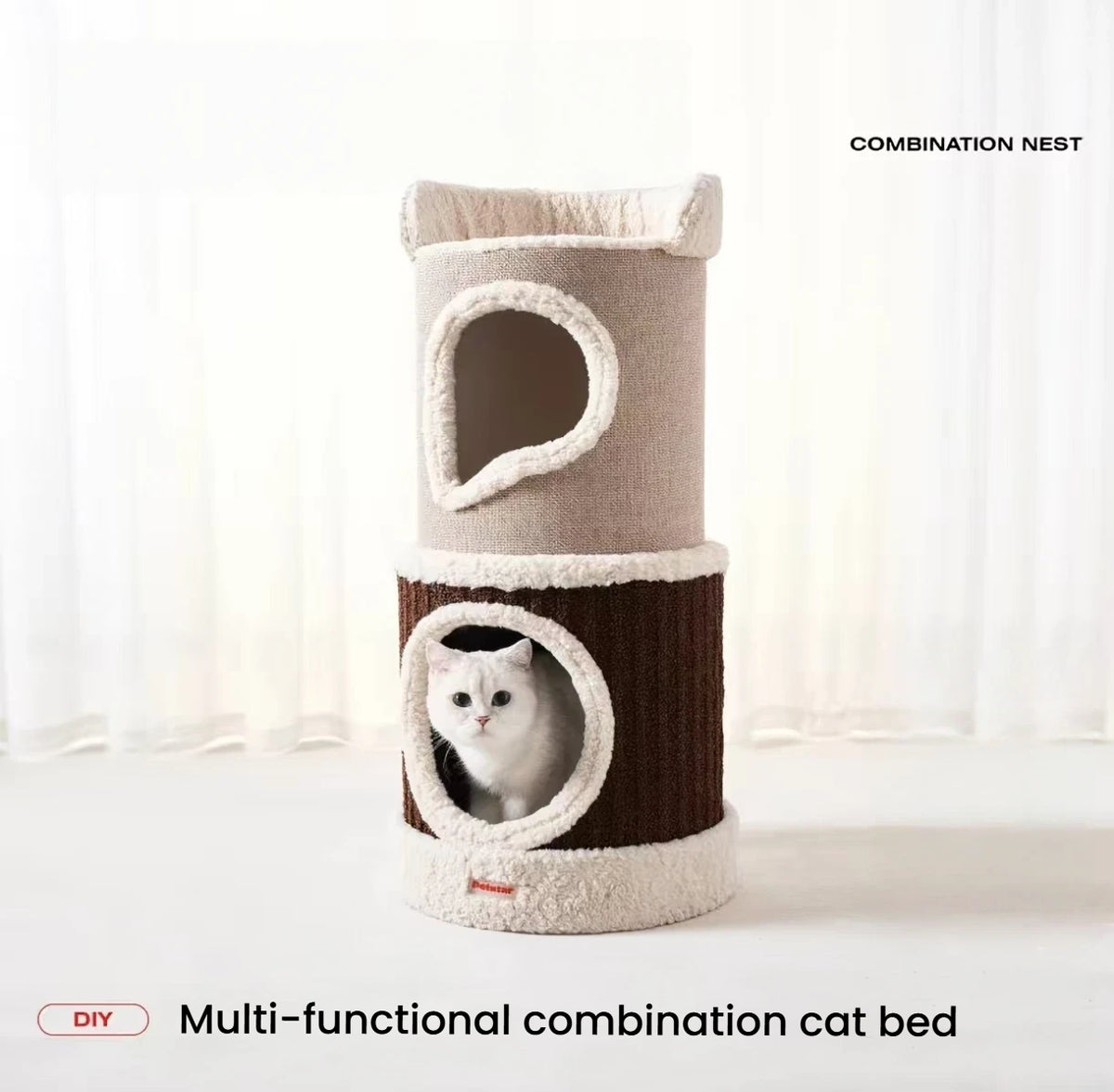 Cat looking out from the lower cave of a stacked Petstar modular cat house