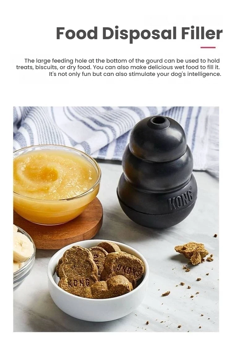 Black KONG Extreme toy beside treats and a bowl of filling