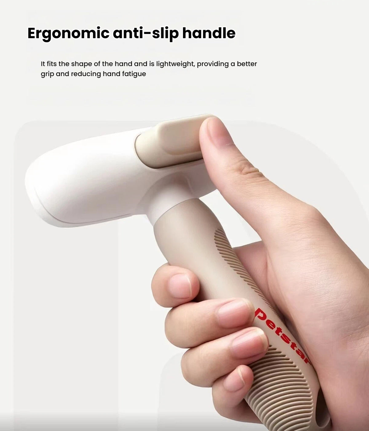 Hand holding the textured Petstar deshedding comb handle