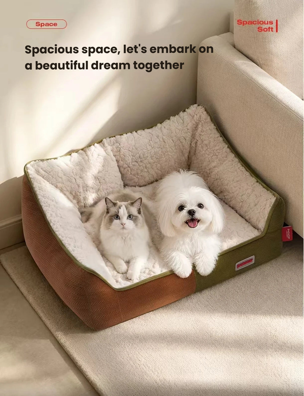 Cat and small white dog resting together in a Petstar sofa bed