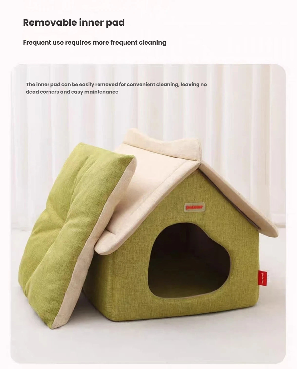 Petstar cat house beside its removable green inner cushion
