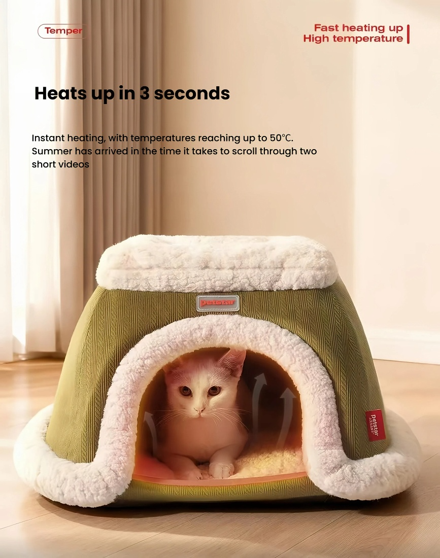 Cat resting inside the green Petstar heated house