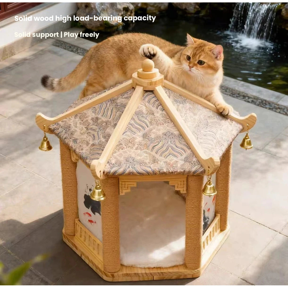 Cat lying on the roof perch of the wooden cat house