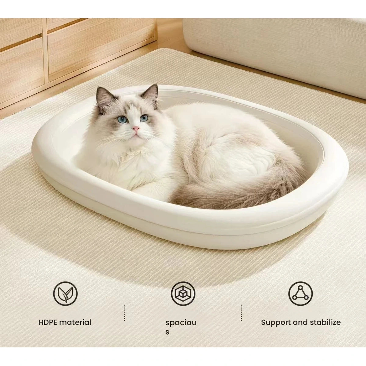 White oval pet bed with cat and feature callouts