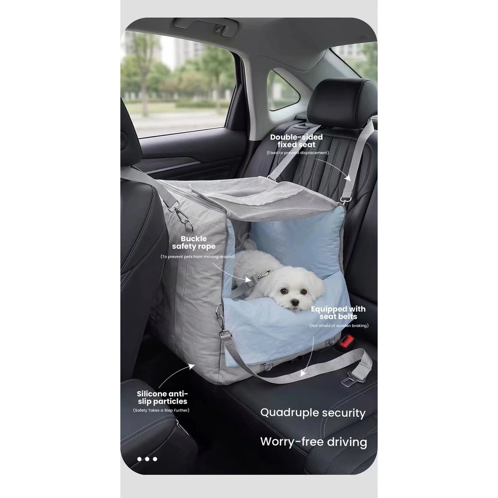 Small dog resting in the POPOCOLA car bed in a vehicle