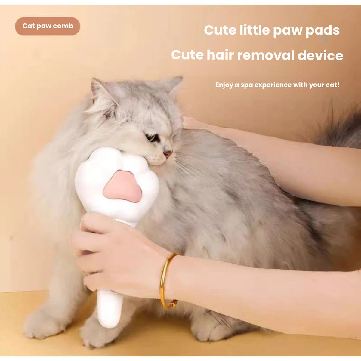 Cat brushed with paw-shaped deshedding tool