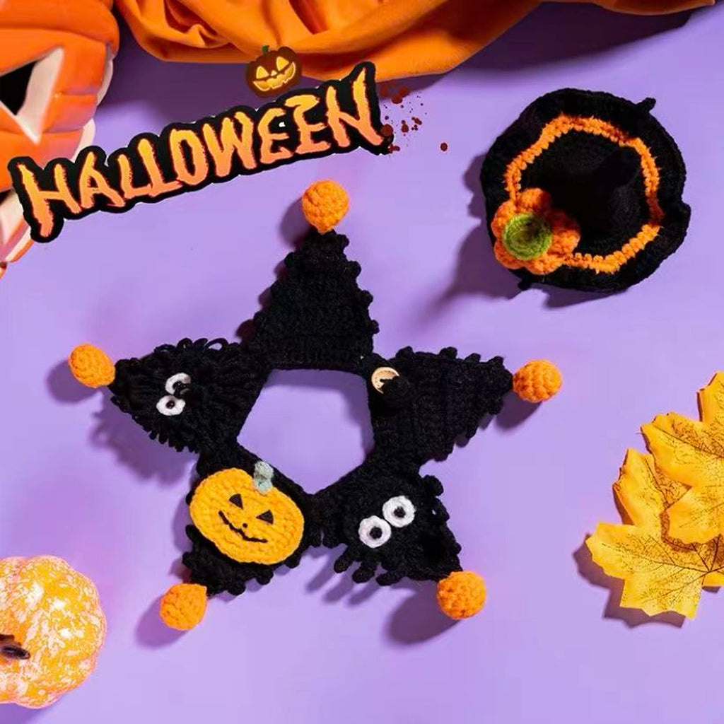 Black and orange crochet cat costume on violet background