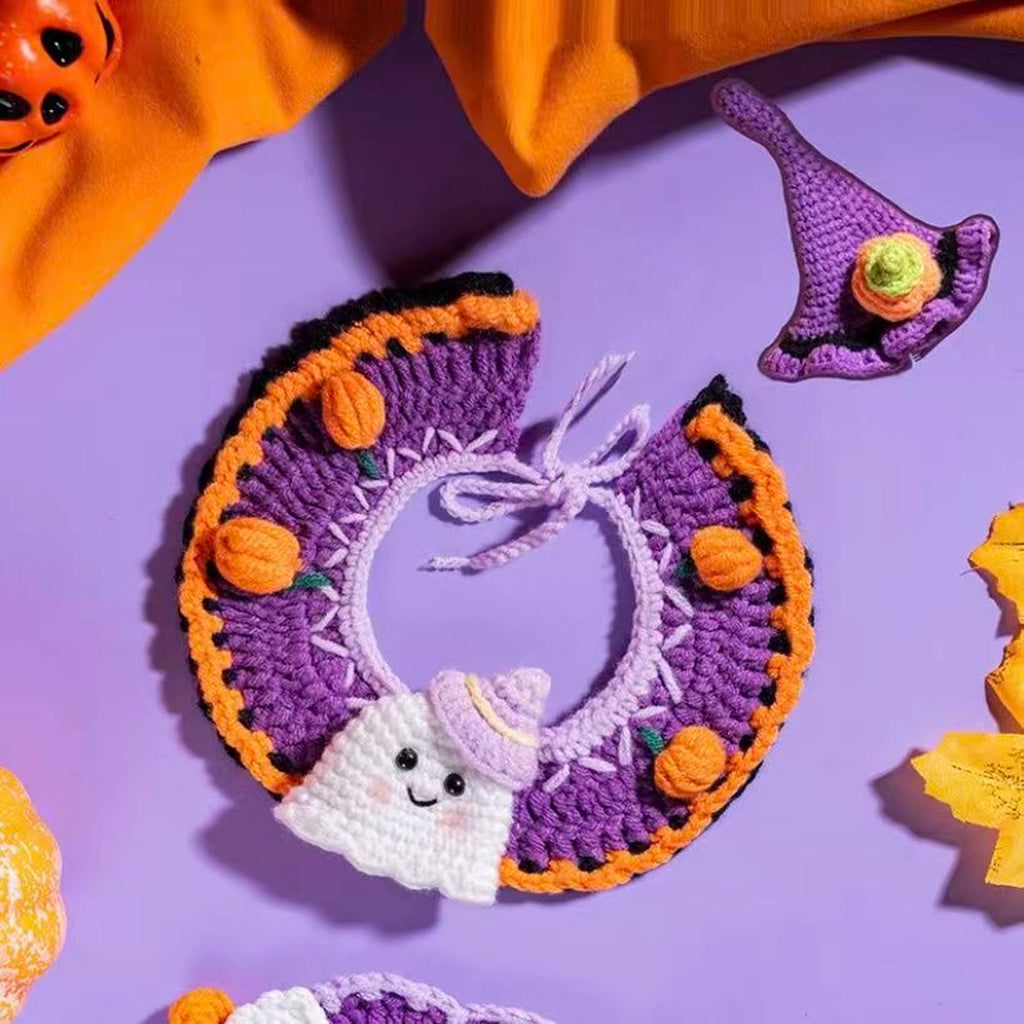 Purple spiderweb pet collar laid flat