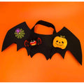 Black bat-wing pet costume with Halloween charms