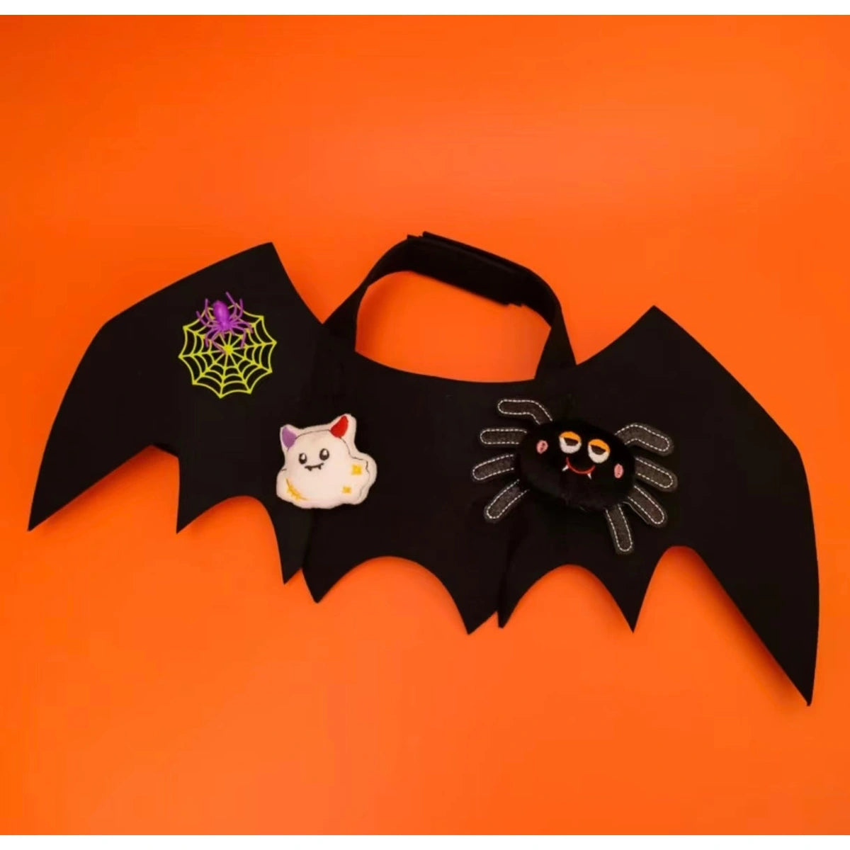 Bat wings with spider and ghost details
