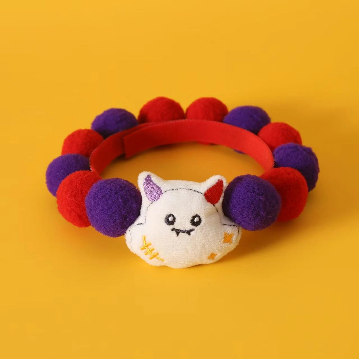 Purple and orange ghost pet collar laid flat
