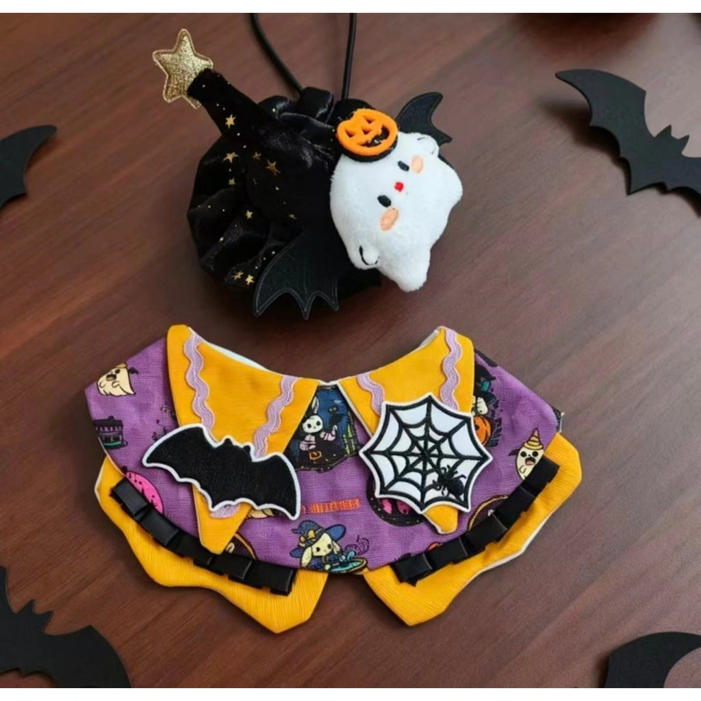 Black ghost costume detail on wooden background