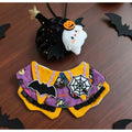 Black ghost costume detail on wooden background