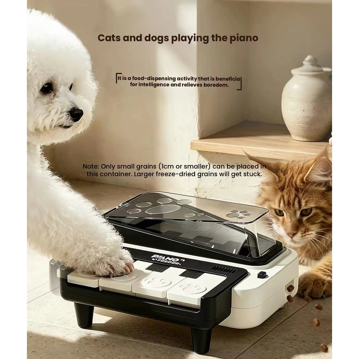 Dog and cat beside piano-style treat dispenser