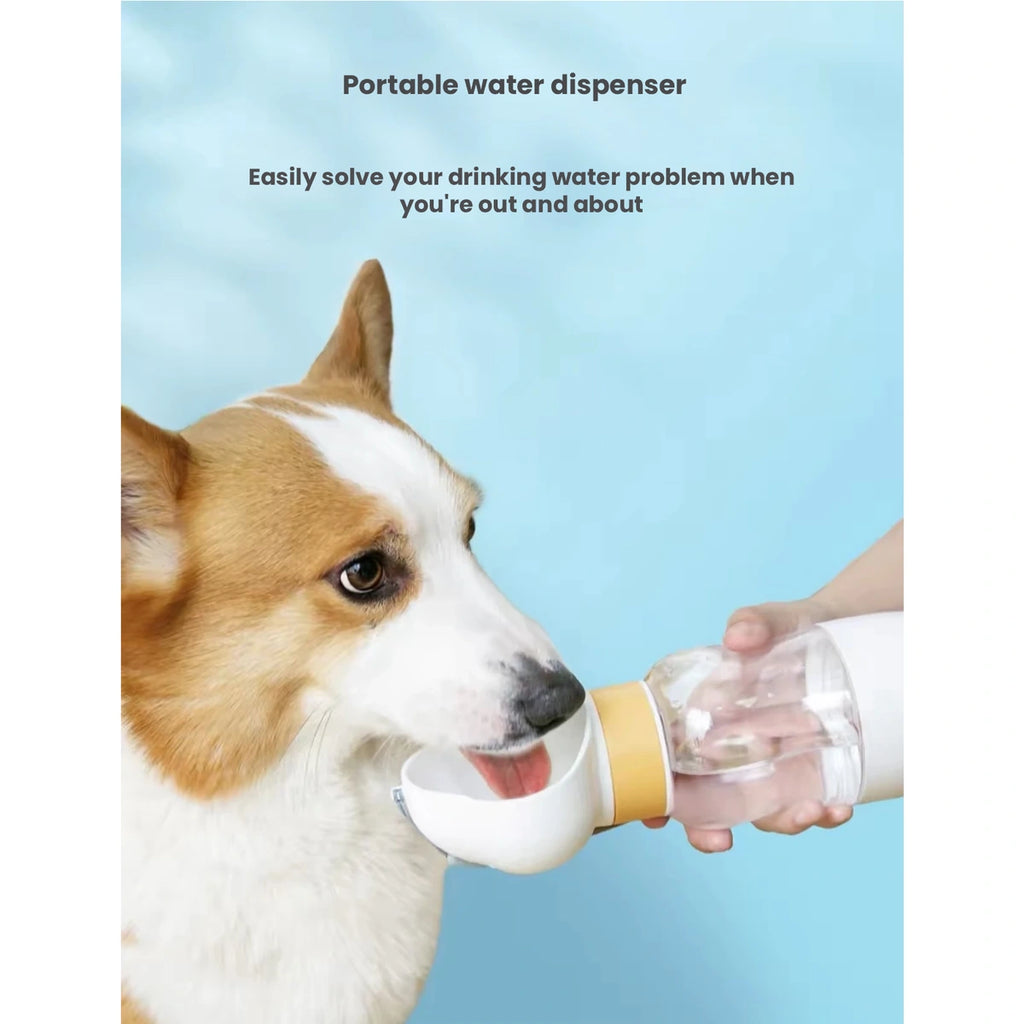 Dog drinking from the Hipidog portable water bottle trough