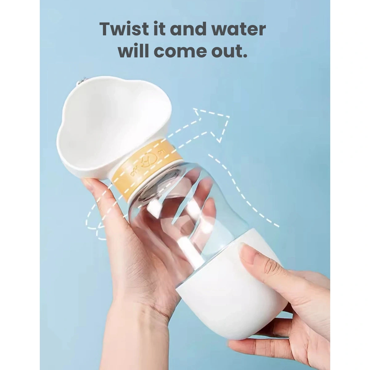 Hand twisting the Hipidog dog bottle to release water into the trough