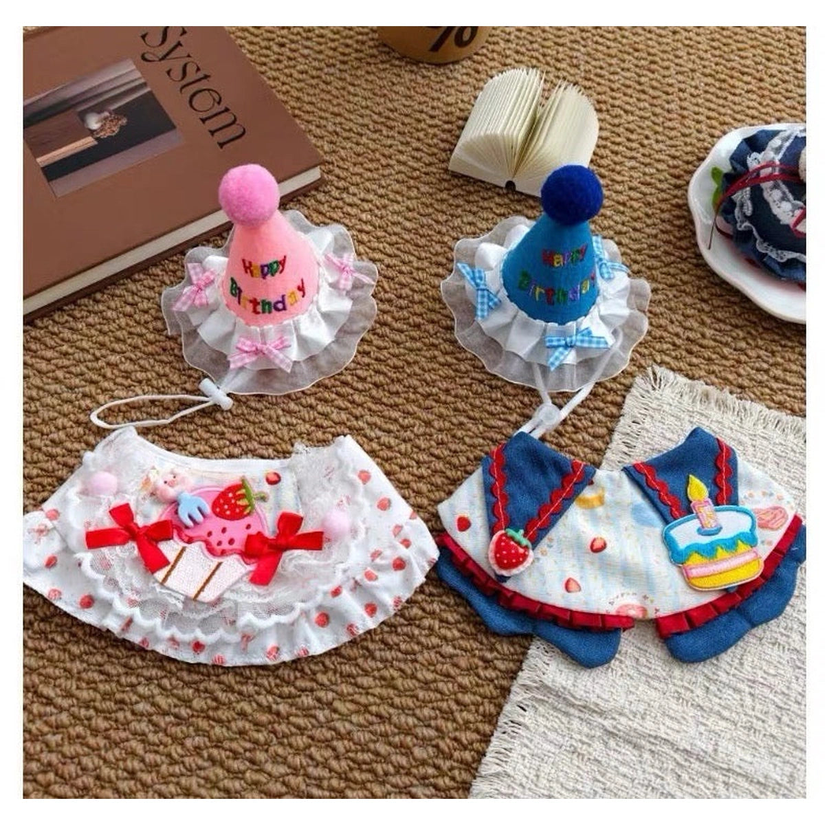 Pink and blue pet birthday hat and bandana options laid out separately