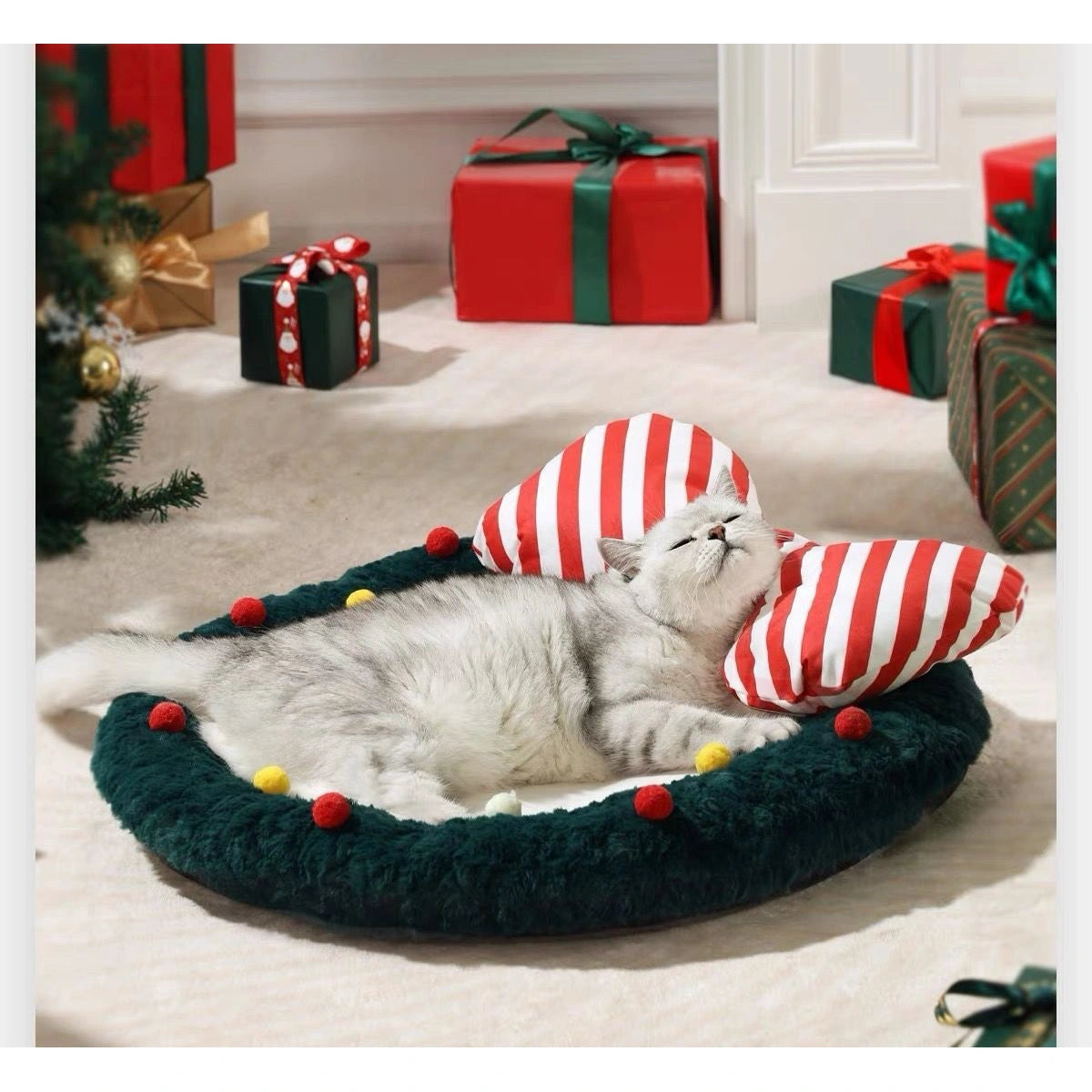 Small dog resting in the green round Christmas pet bed