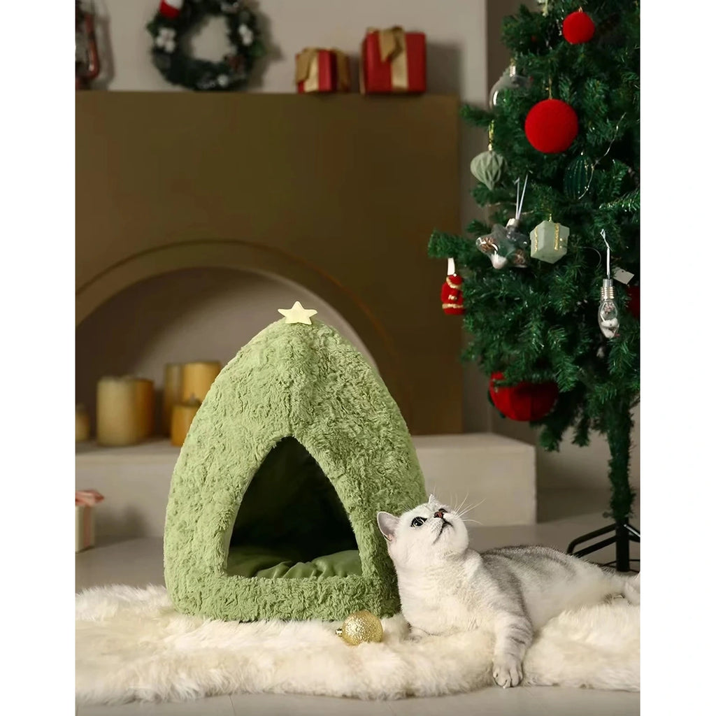 Cat beside the green UFBemo Christmas-tree pet house