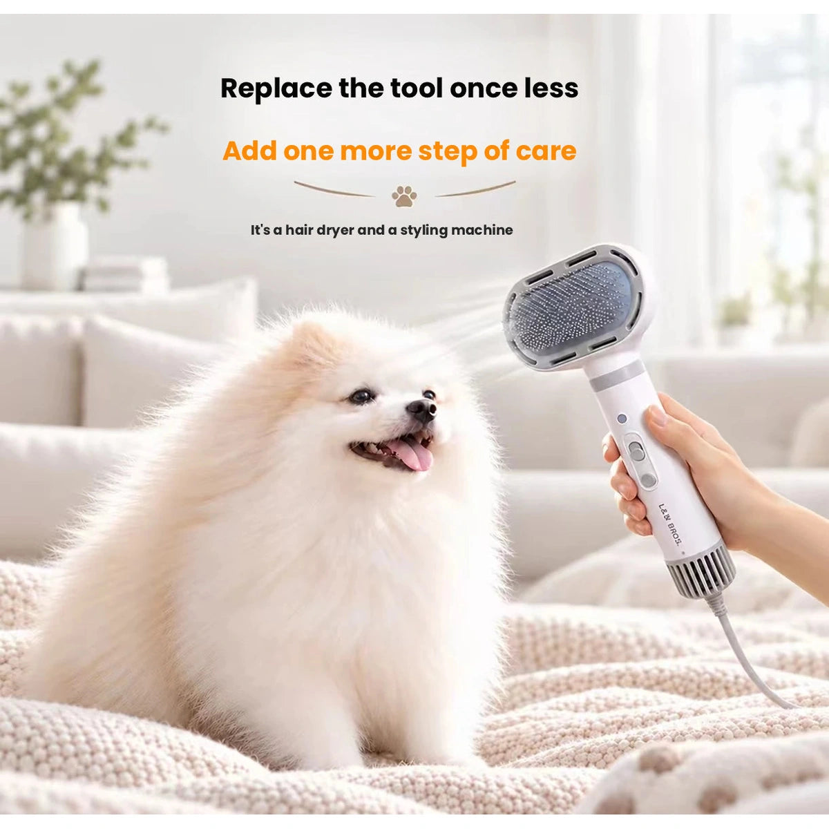 White pet dryer used on a small fluffy dog
