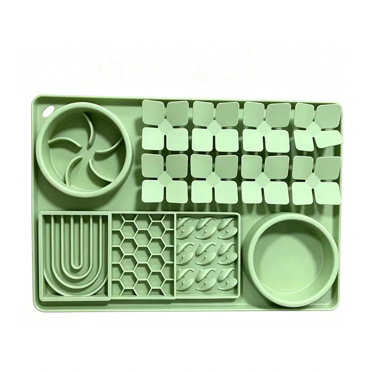 Light green silicone slow feeder mat with textured sections