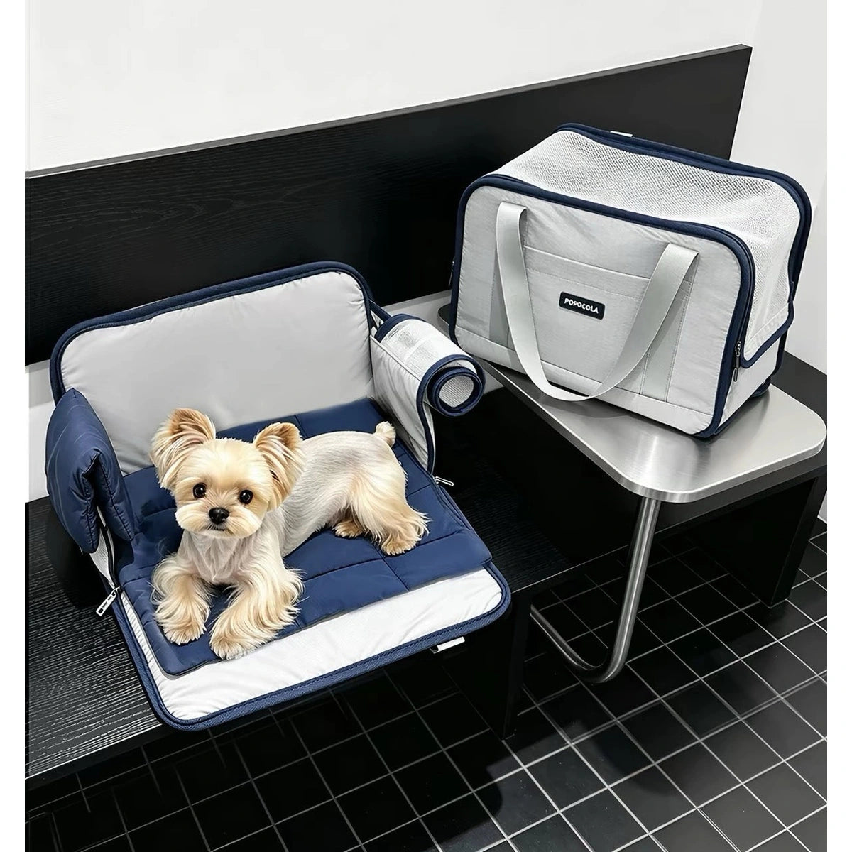 Small dog resting inside an open POPOCOLA carrier bag