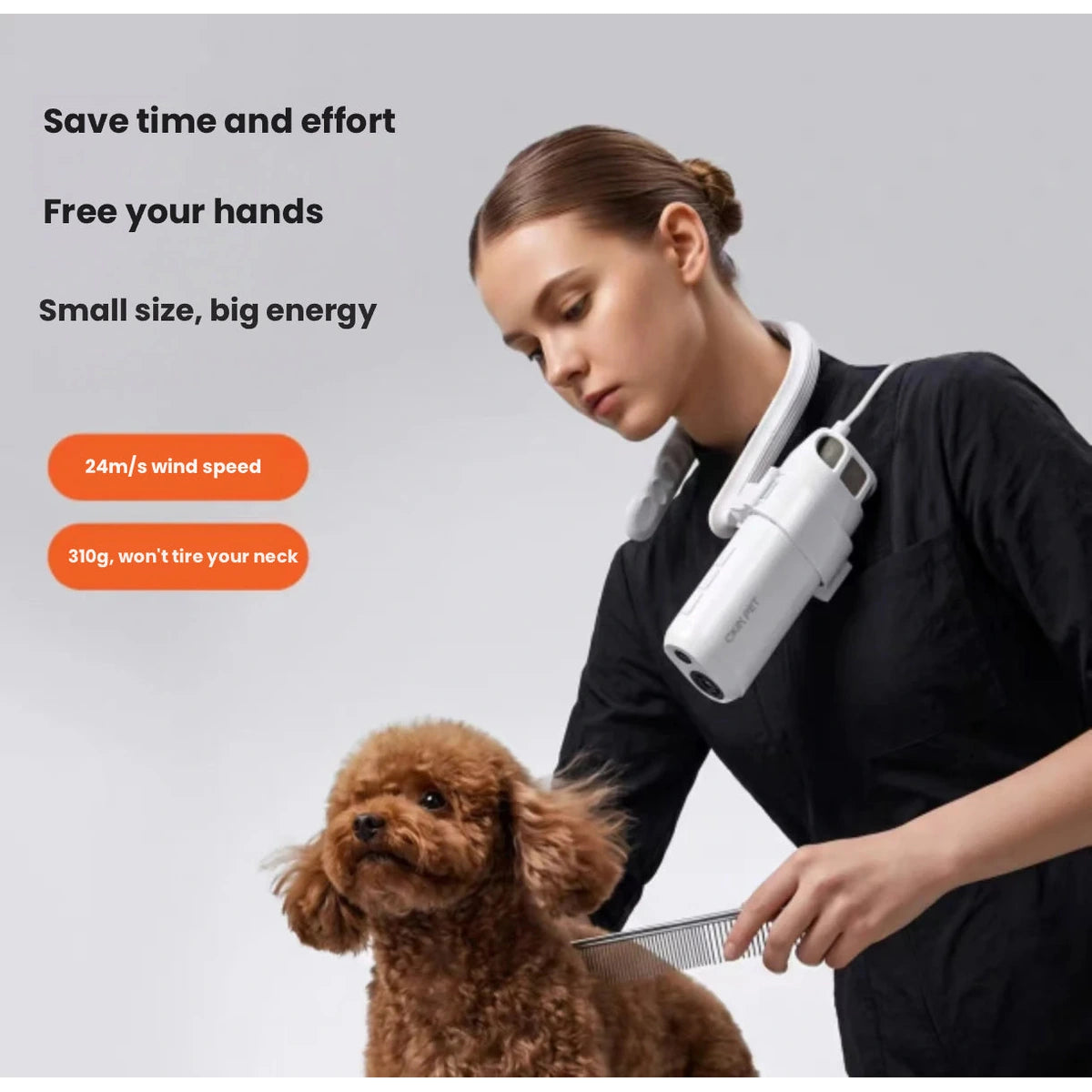 Pet groomer using hands-free Ckin Pet dryer on a dog