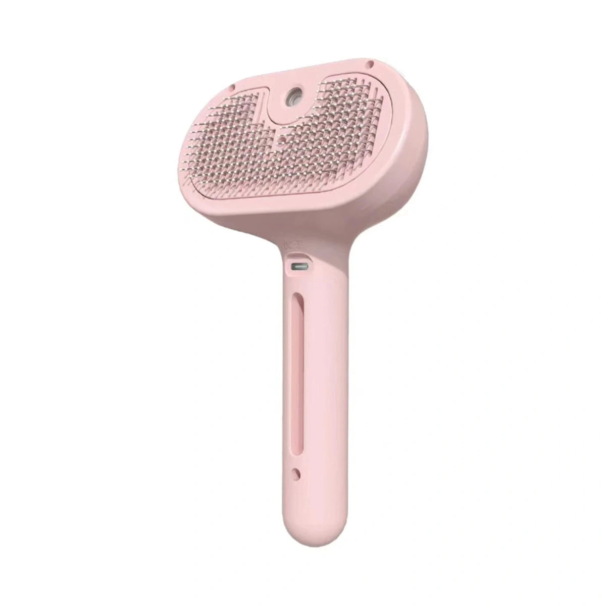 Pink spray pet grooming brush on white background