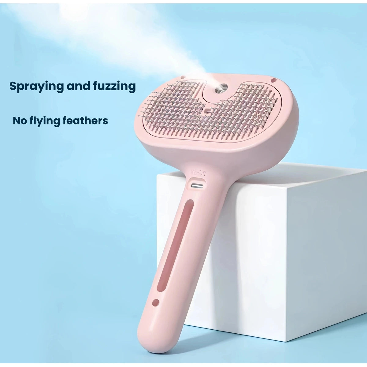 Pink pet grooming brush showing fine mist spray
