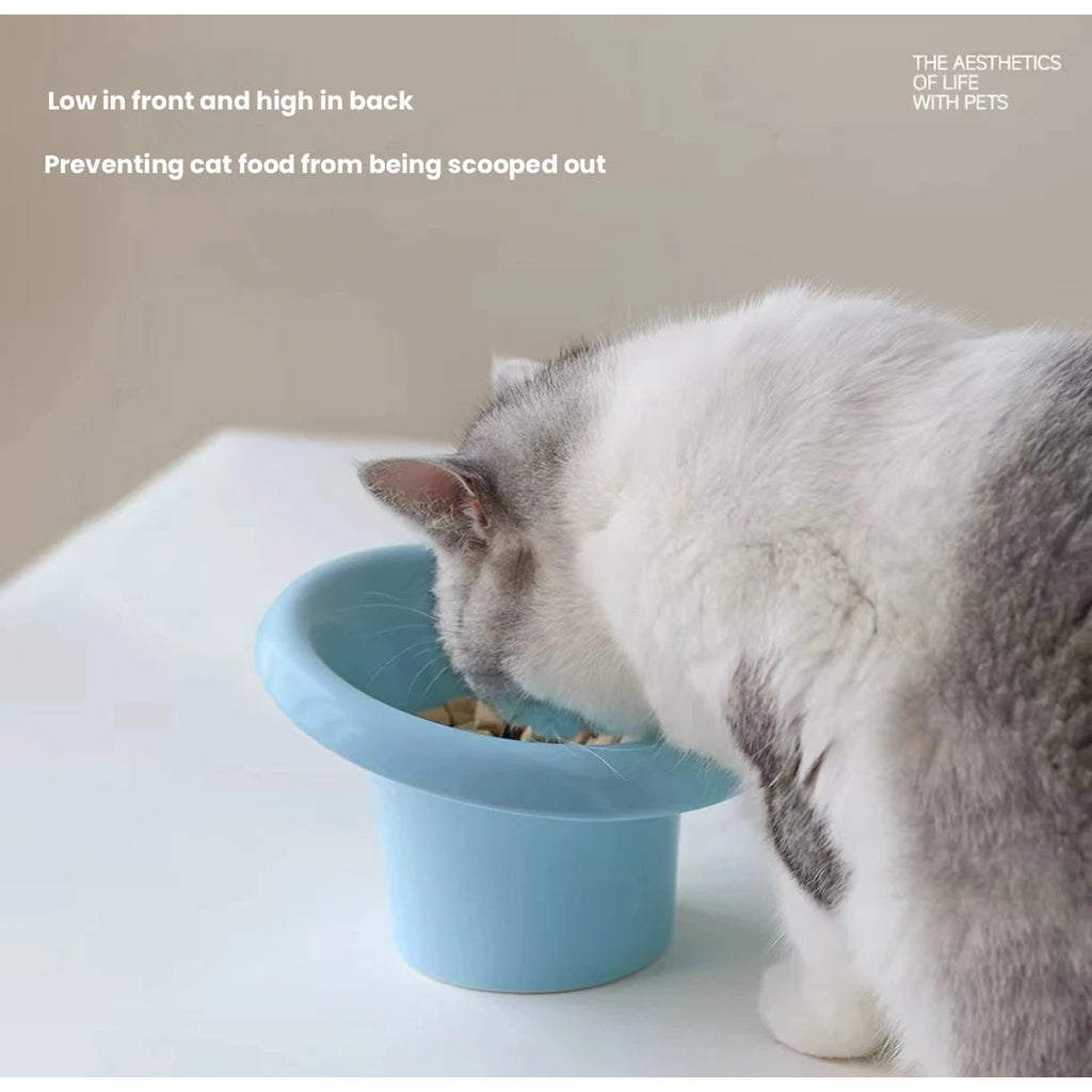 Meoof Fafa pet bowl: cat eating from blue bowl at floor