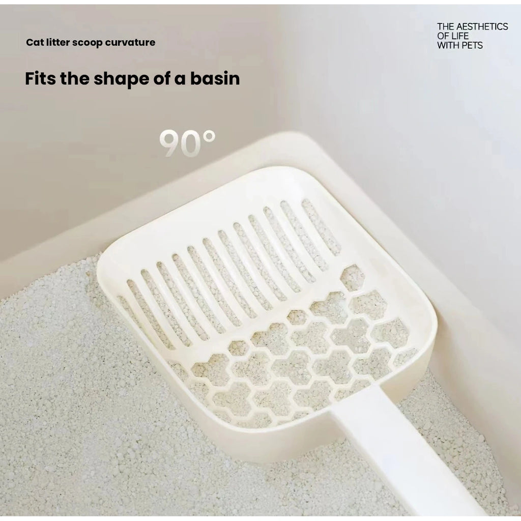 Close-up of cream Meoof litter scoop slots