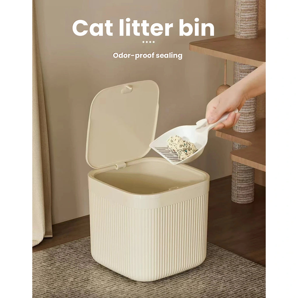 Hand scooping cat litter waste into a cream ribbed bin
