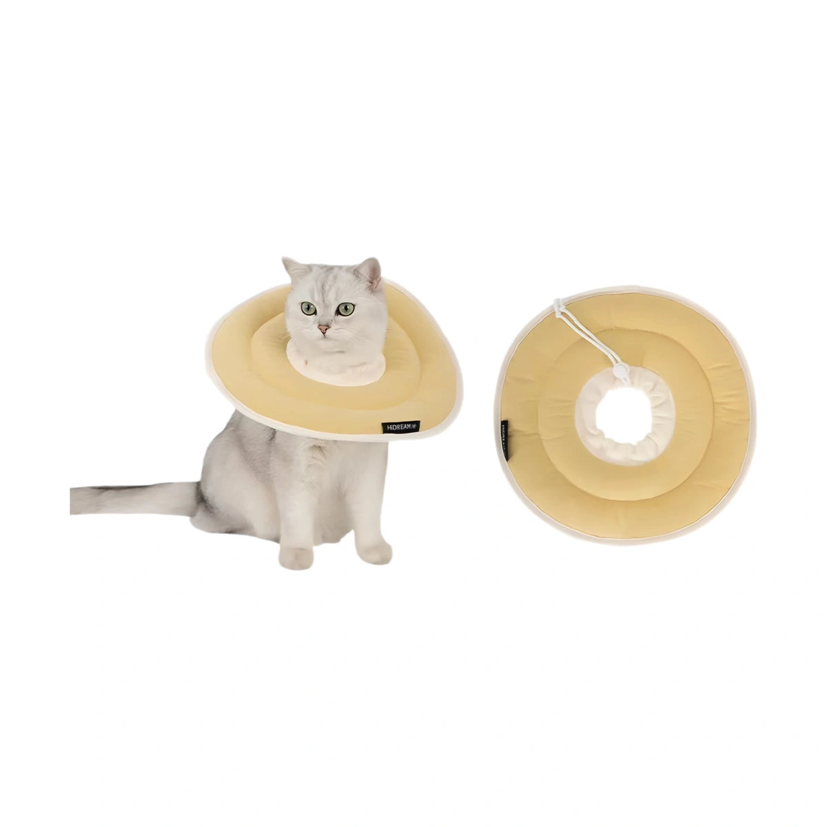 Yellow HiDREAM donut collar on a white cat