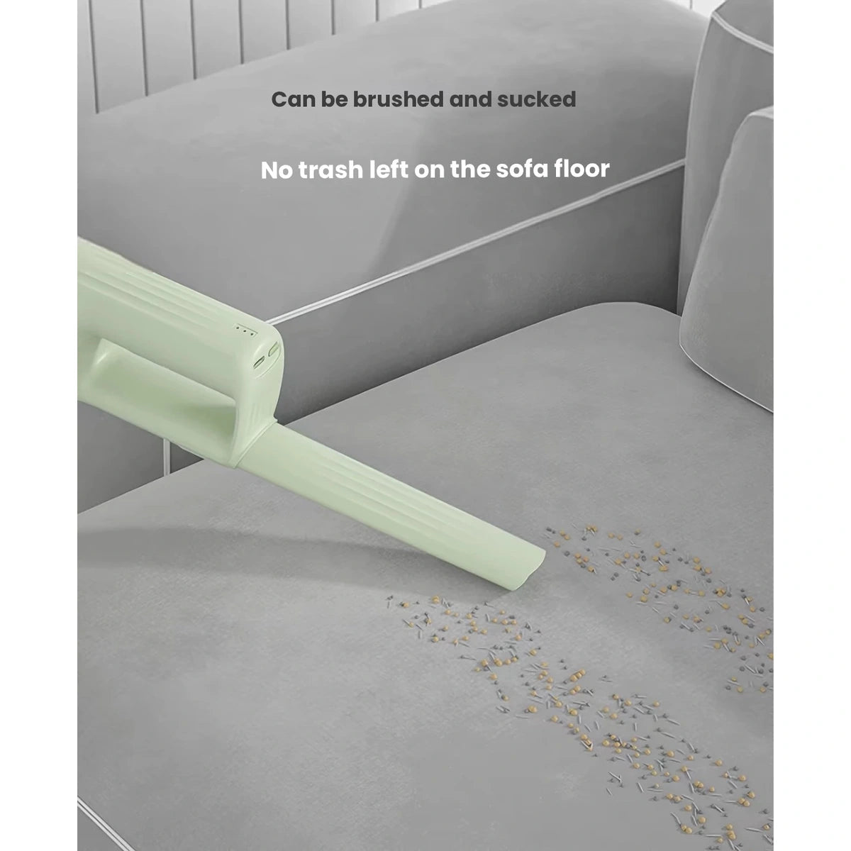 Green grooming vacuum brush cleaning pet hair from a sofa