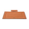 Orange Fairypet rectangular outdoor mat with a carry handle