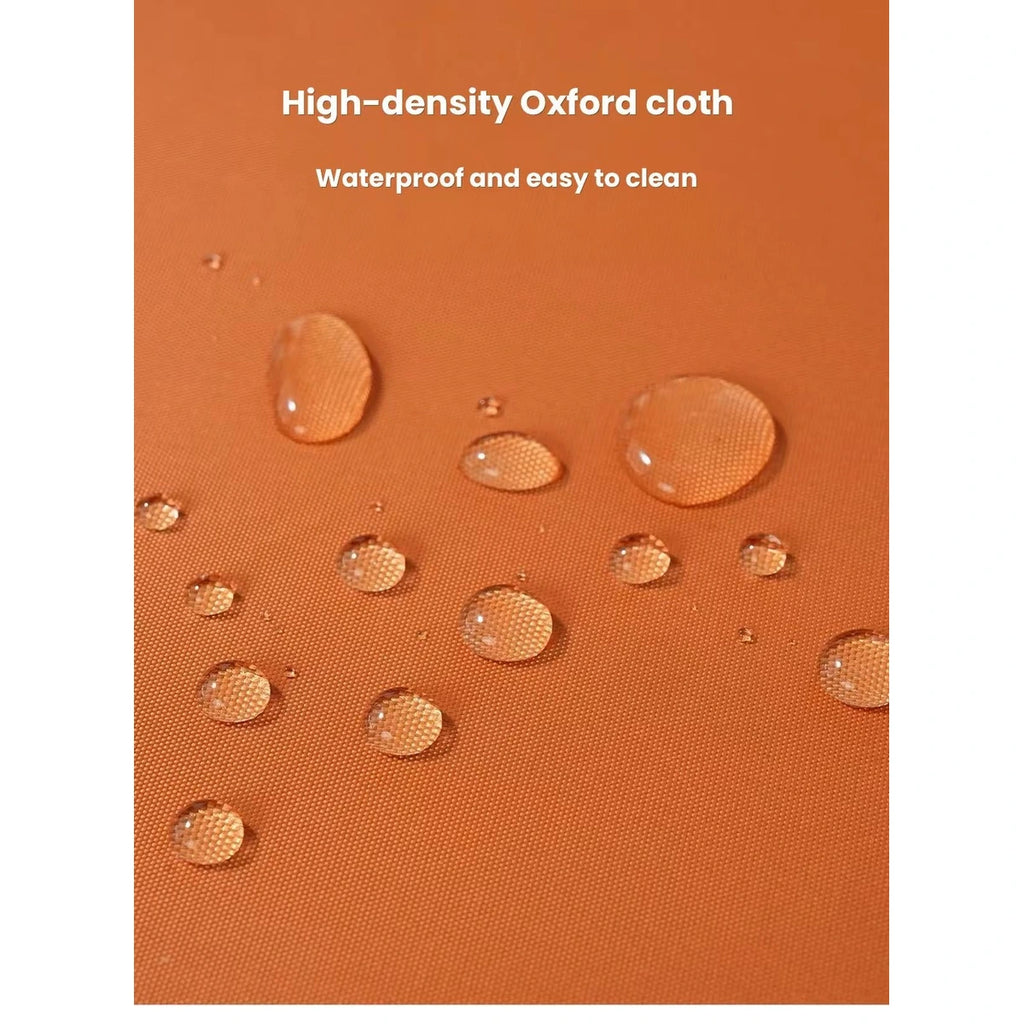 Water droplets on the orange Fairypet mat surface