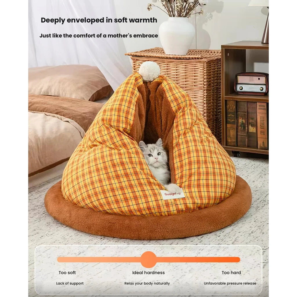 Cat resting inside the yellow checked cat cave bed