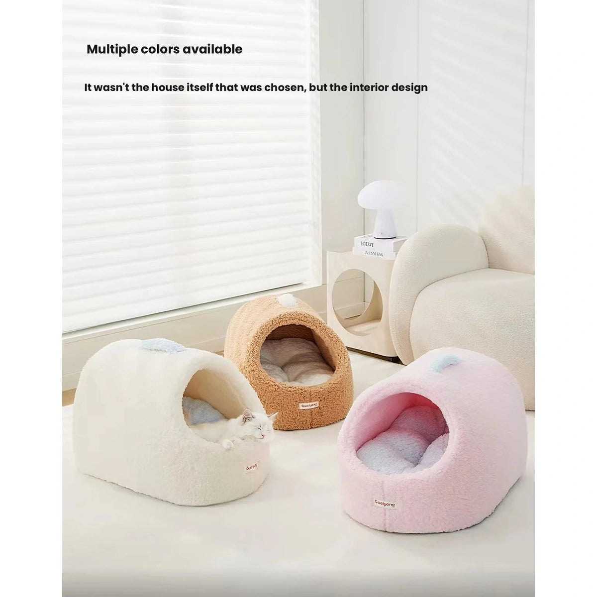 Brown, cream and pink cat cave beds displayed together
