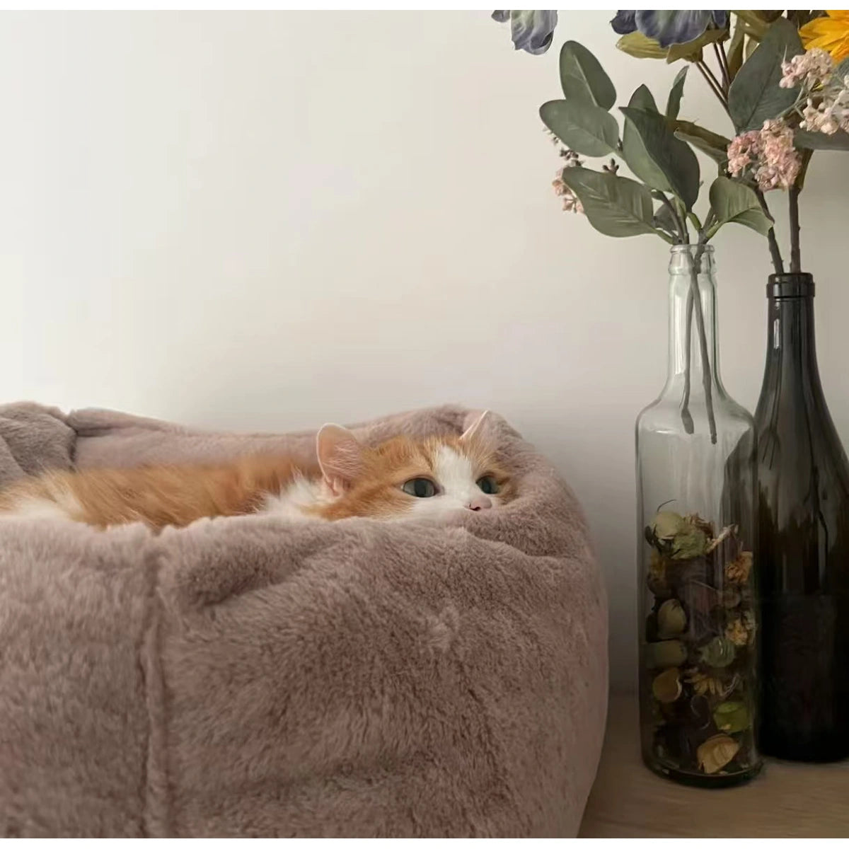 Brown inFluffy faux fur bed shown on a chair