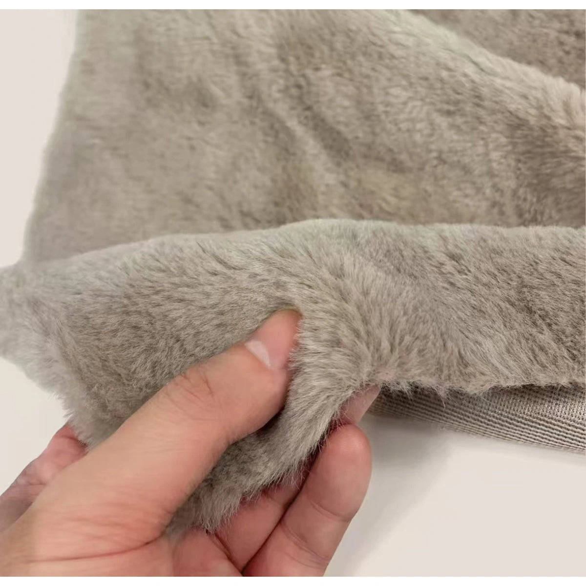 Close-up of the inFluffy bed plush fabric