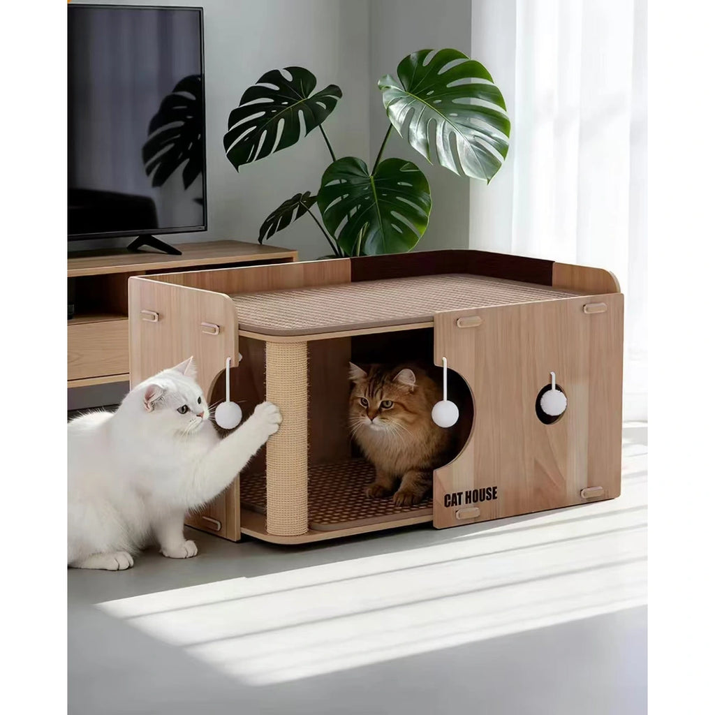 Two cats using the upper and lower levels of the wooden cat bed