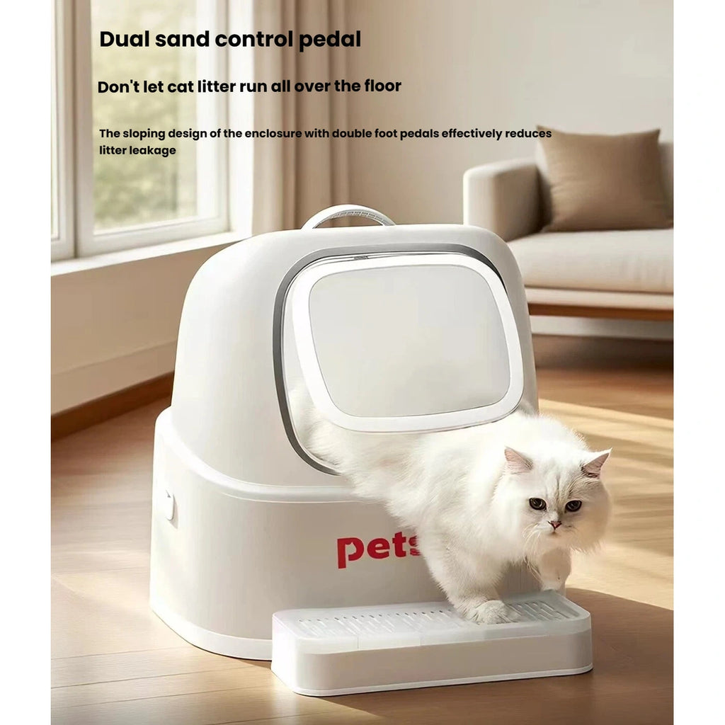 Cat stepping out of the Petstar litter box onto the slotted entry platform