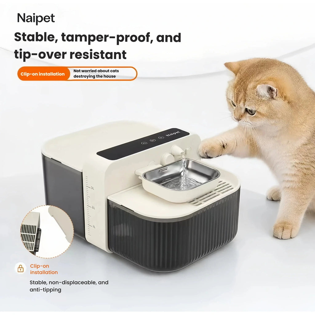 Cat beside the Naipet fountain with its clip-on guard highlighted