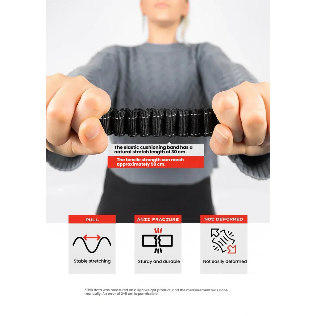 Hands stretching the shock-absorbing section of a black EzyDog Zero Shock leash