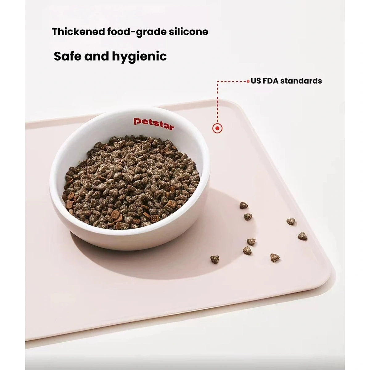 Petstar silicone mat beneath a kibble bowl with scattered dry food
