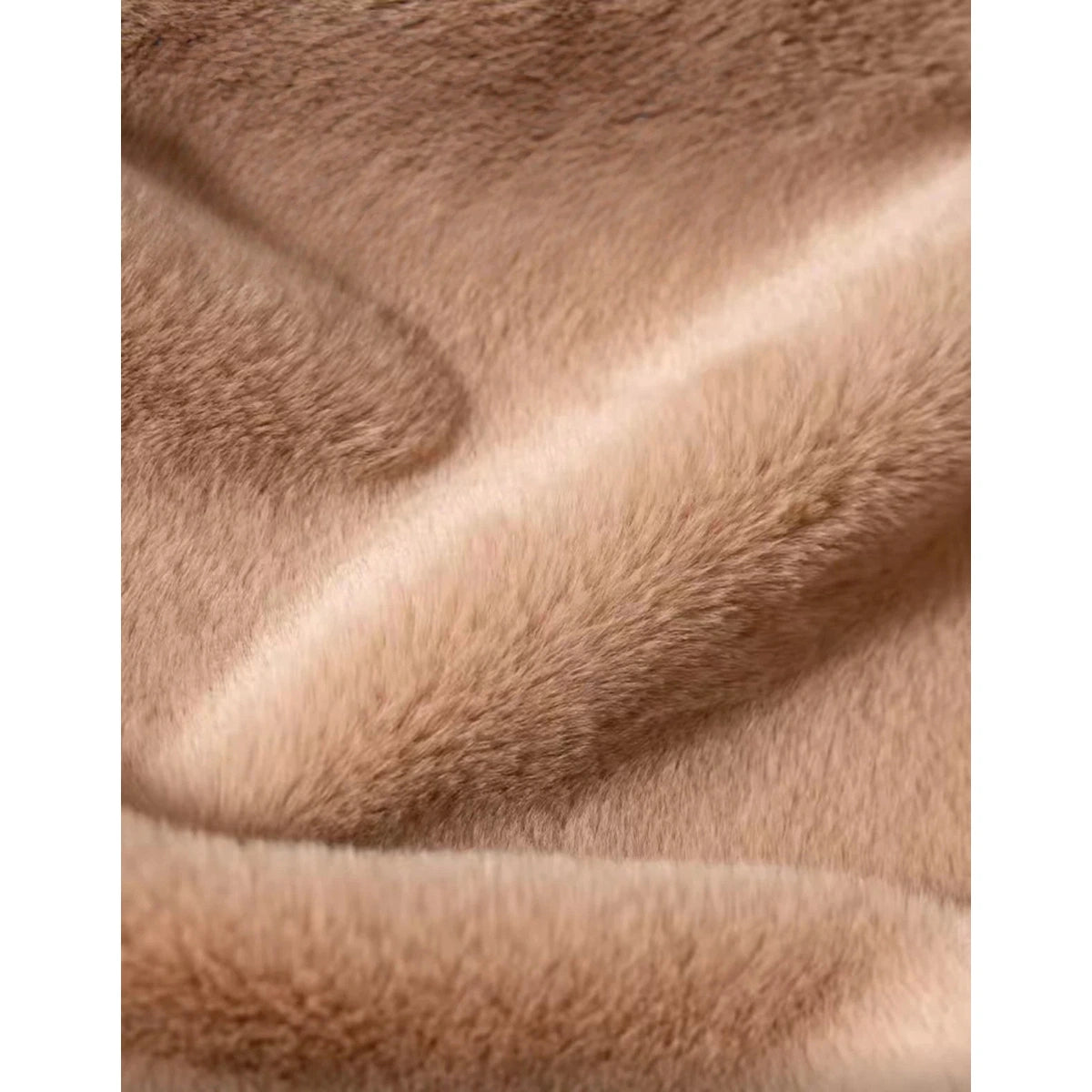Close-up of the beige cat house’s plush fabric texture