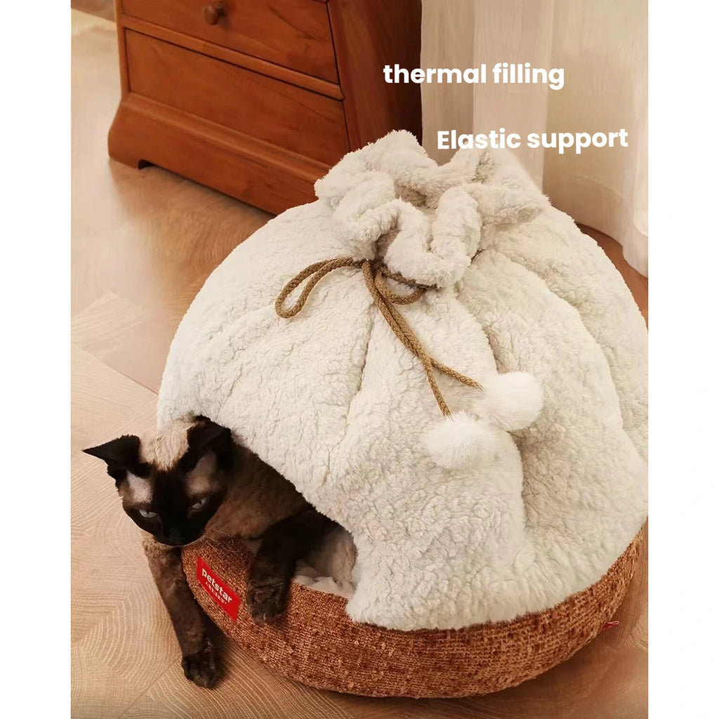 Petstar beige cave bed beside wooden furniture with a cat at the entrance