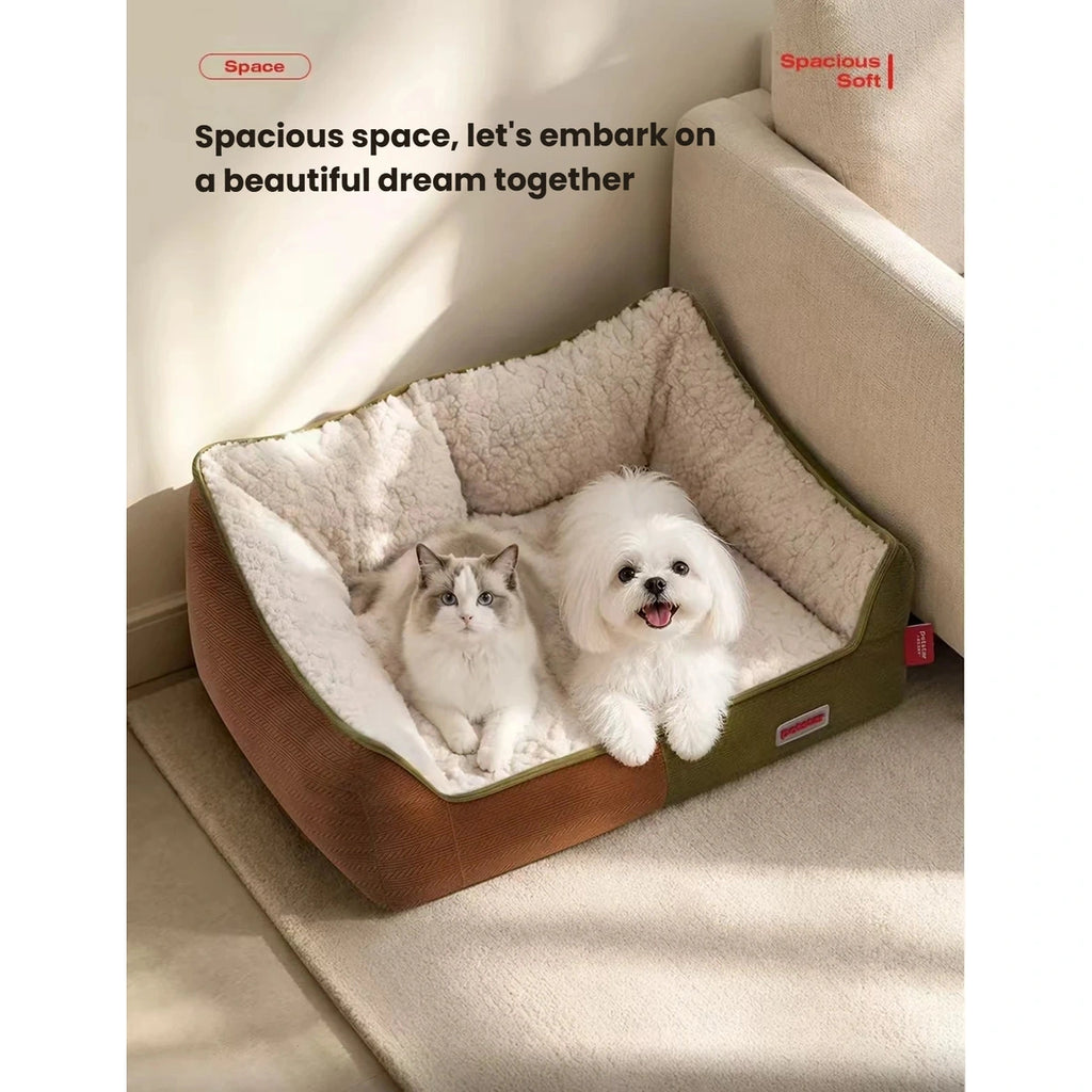 Cat and small white dog resting together in a Petstar sofa bed