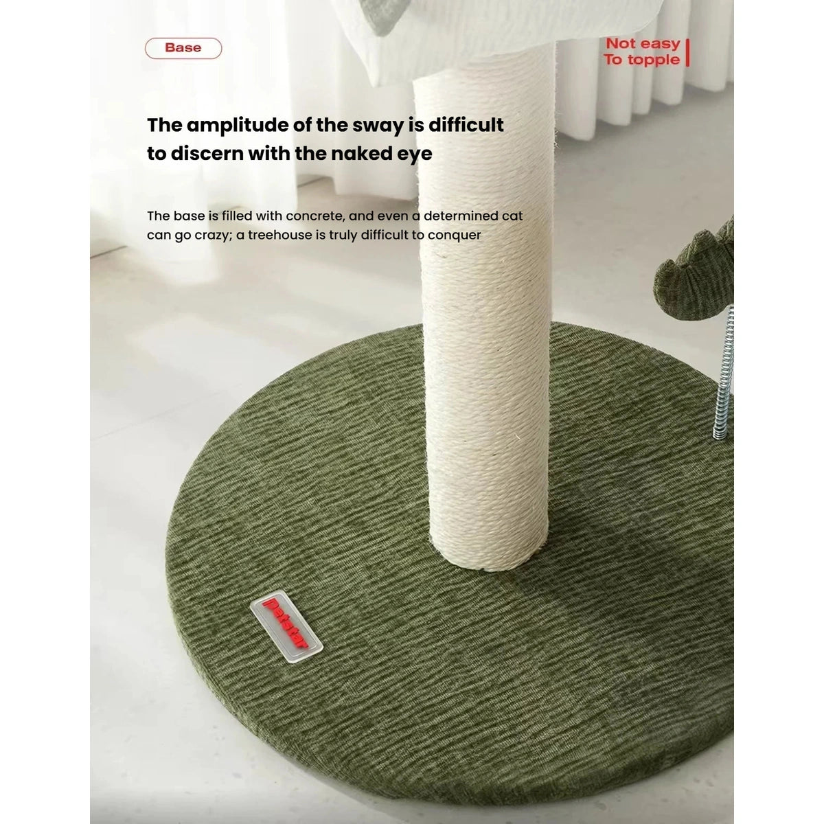 Close-up of the wrapped scratching post and green base