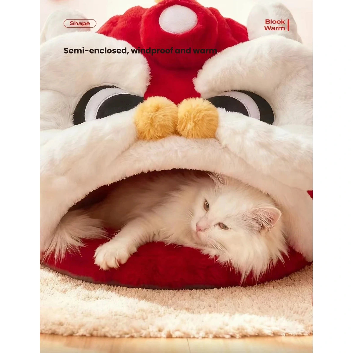 Cat curled beneath the soft roof of the Lion Dance bed